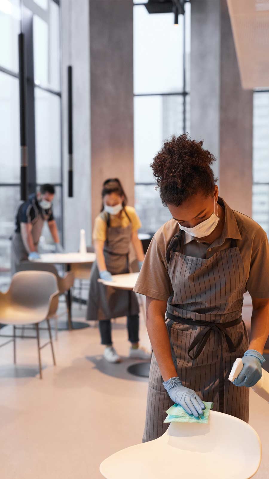 Retail cleaner in uniform